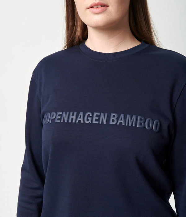 Marinblått joggingset i bambu med logotyp